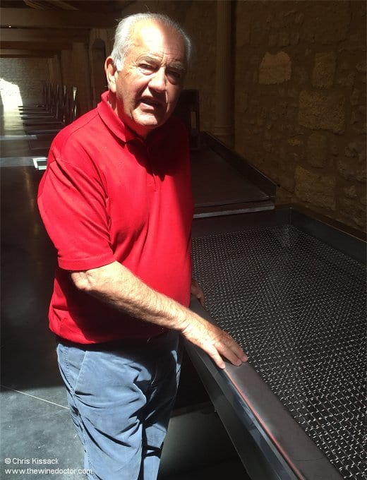 Alfred Tesseron, with his new electricity-free destemming and sorting tables, at Château Pontet-Canet, May 2018 Château Pontet-Canet