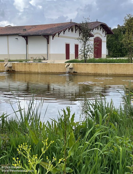 An oasis of calm in Pauillac; pond and chai, at Château Duhart-Milon, April 2024 Bordeaux 2023